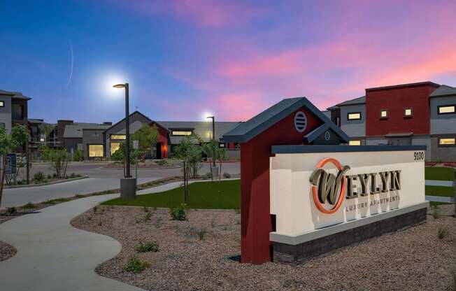 a building with a sign that reads cyber valley at sunsetat Weylyn Luxury Apartments, Laveen, AZ 85339