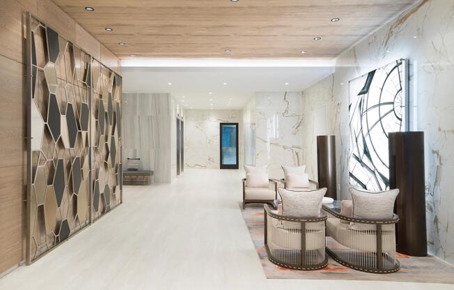 A refined lobby lounge with layered textures, curated seating, and welcoming spaces to pause or connect.