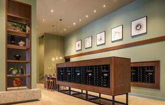 A room with a large wooden cabinet and a shelf with plants and vases.
