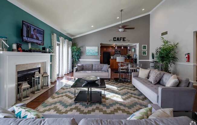 a living room with couches and a coffee table