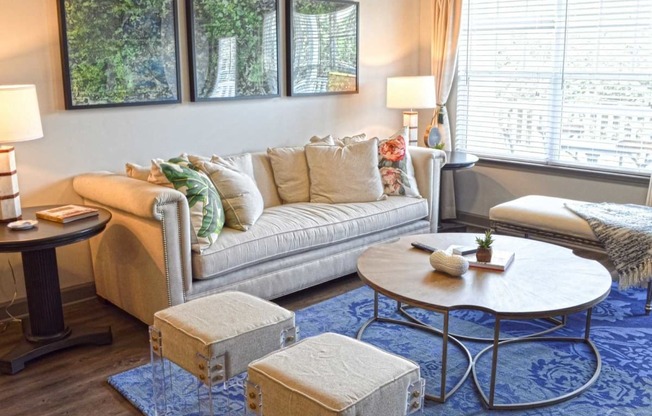 a living room with a couch and a table