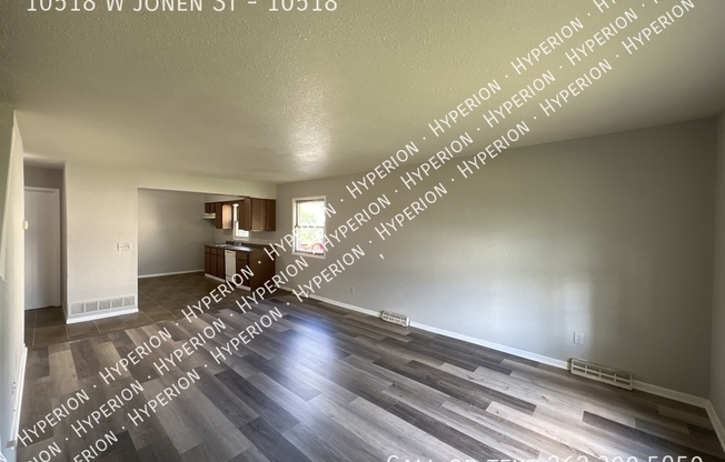 10518 W JONEN ST
