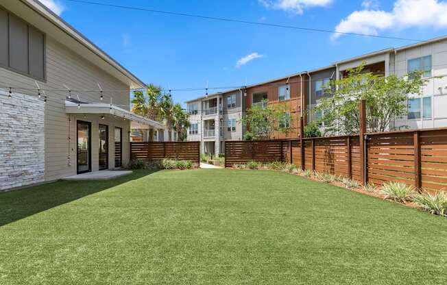 A sunny day at a residential area with a well-maintained lawn.