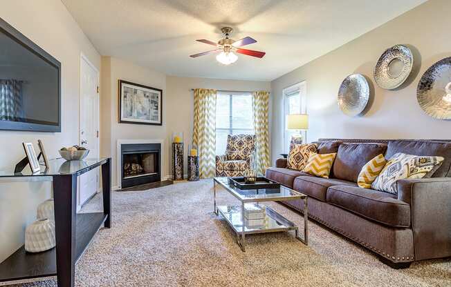 Living Room With Fireplace at Canter Chase Apartments, Louisville, KY, 40242