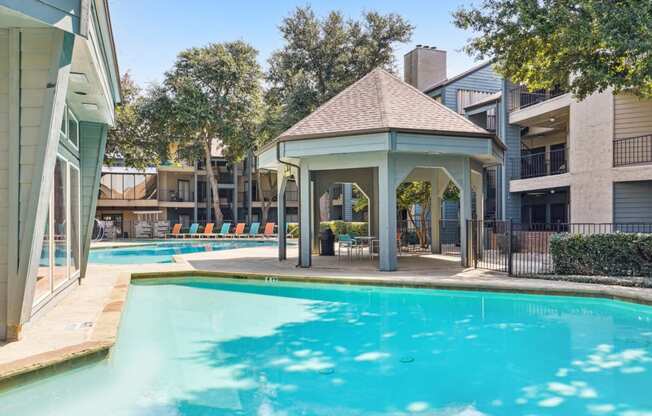 Inviting pool for sunbathing at Laurels of Sendera apartments in Arlington, TX