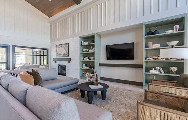 a living room with a couch and a tv