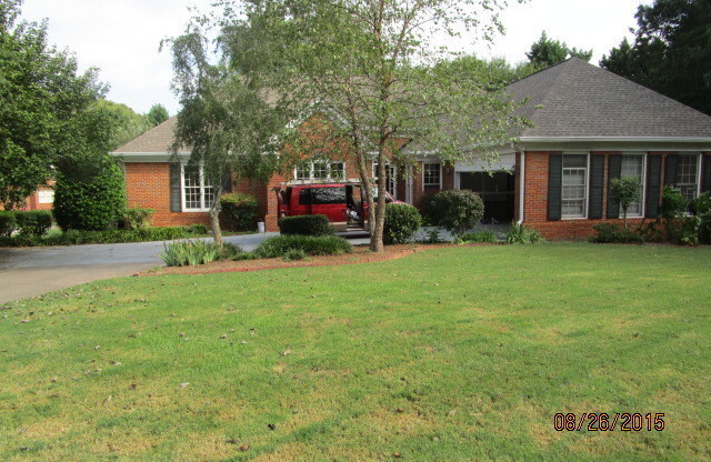 Four-Sided Brick Ranch in Johns Creek!