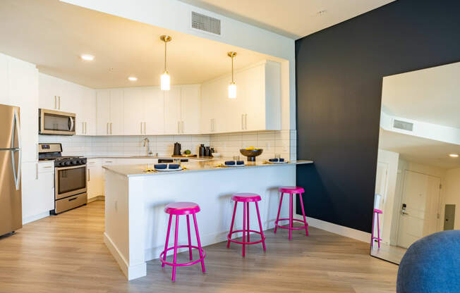 Stylish kitchen with breakfast bar at The Chandler in North Hollywood