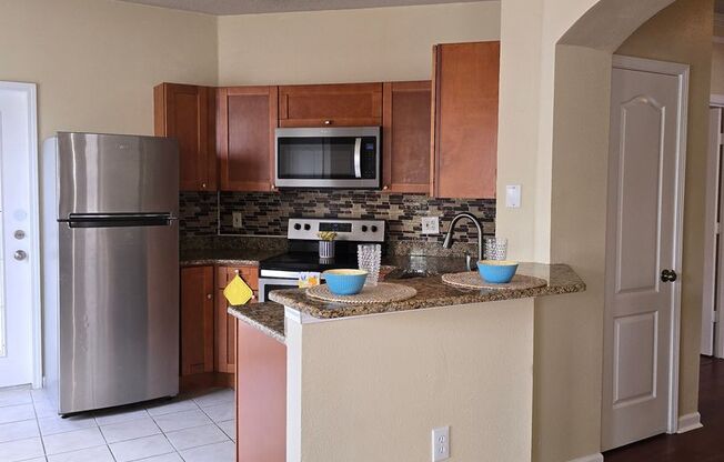 Comfortable Condo Living with 2-Car Garage in the Heart of New Tampa