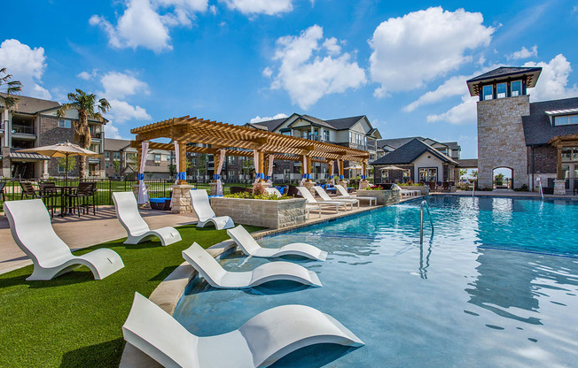 Resort-style Swimming Pool with Sunning Ledge and Beach Entry