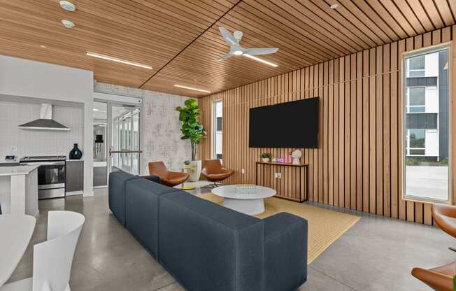 a living room with a couch and a table and a television