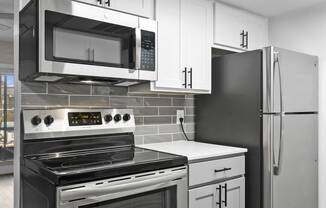 SITE Scottsdale Apartments Renovated kitchen with stainless steel appliances