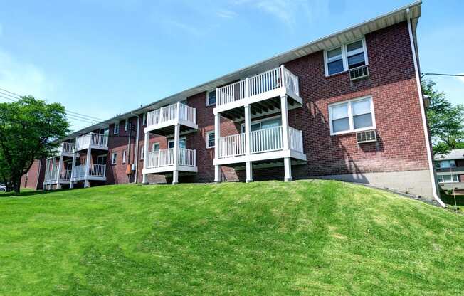 our apartments are located on the top of a green hill