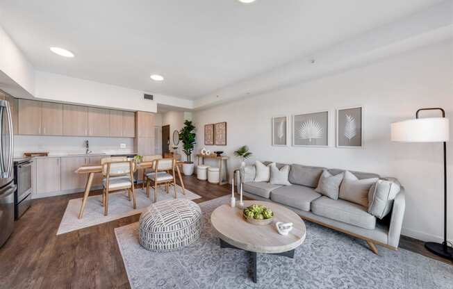 A living room with a couch and a table