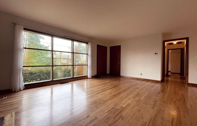 Charming Mid-Century Ranch with Large Yard and Attached Garage