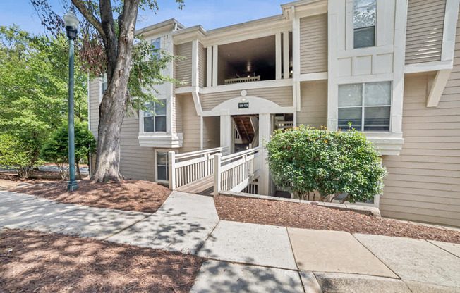 A building with a tree in front of it at Beacon Ridge Apartments, PRG Real Estate Management, Greenville, 29615