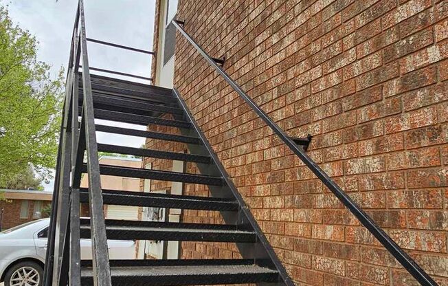 2nd story 2 bedroom, 1 bath condo with central heat and air and one car garage.
