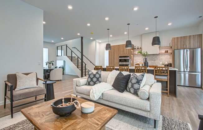 a living room with a couch and a table