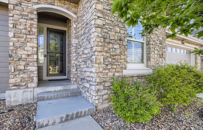 Stunningly Beautiful Highlands Ranch Home Offers over 5300 sqft of Living Space, Gourmet Kitchen & Minutes from Rock Canyon High School.