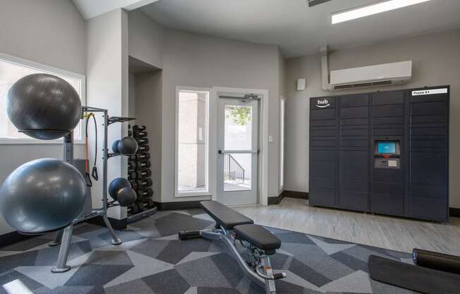 a gym with a punching bag and other exercise equipment