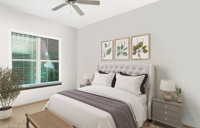 a bedroom with white walls and a large window with blinds