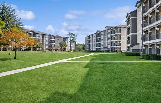 greenspace and exterior view of Park at Magnolia apartments