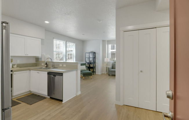 Modern Ground-Level Condo in River Terrace with Pool, Gym & Courtyard Views