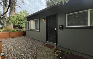 Charming SE 2 Bed 1 Bath Duplex - Private Patio, Nestled in Trees, 1 Parking Space and W/D Hookups!
