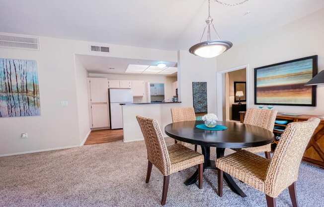 Kitchen open to entertaining area at Ventana Apartment Homes in Central Scottsdale, AZ, For Rent. Now leasing 1 and 2 bedroom apartments.