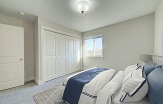 a bedroom with a bed and a window at Copper Pines, Bozeman, MT 