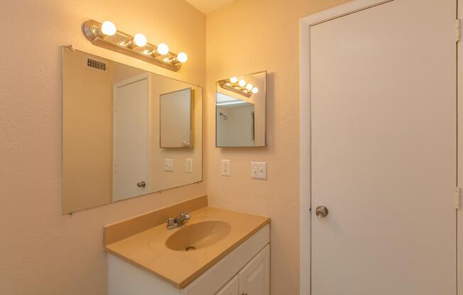 WELL LIT BATHROOMS IN THE PINE PLAN