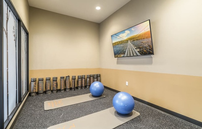 Yoga room with on-demand classes at 360 at Jordan West best new apartments West Des Moines IA 50266