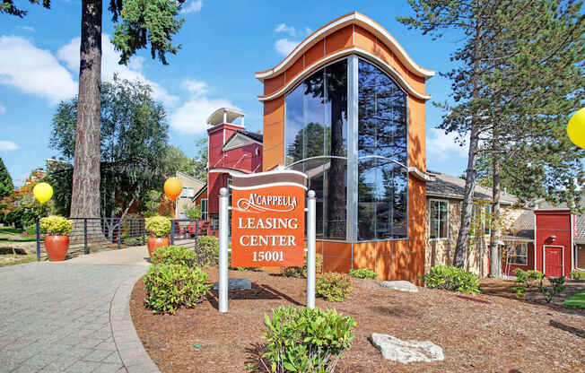 A building with a sign that says Leasing Center.