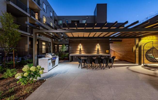 West 38 Apartments Outdoor Barbecue Grill with Seating Area