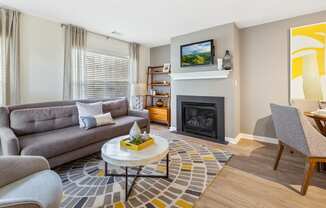 Orchards Apartments Marlborough ma apartment loft style apartments photo of living room with fireplace and large windows and modern furniture