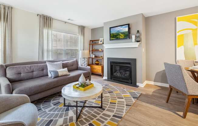Orchards Apartments Marlborough ma apartment loft style apartments photo of living room with fireplace and large windows and modern furniture