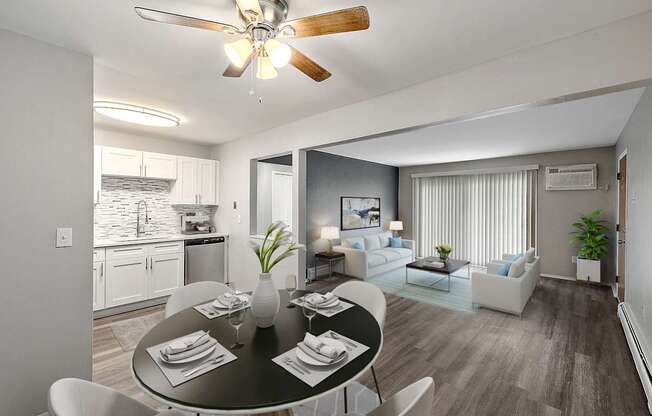 A modern dining room with a black table set for two.