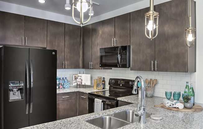 Granite Counter Tops In Kitchen at Residence at Tailrace Marina, Mount Holly, North Carolina
