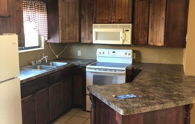 2 Bedroom 1.5  bath townhome with community pool!