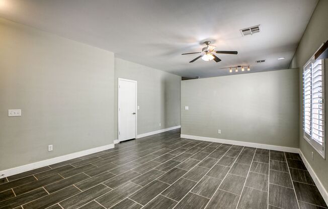 3 Bedrooms Single Story Home with Covered Patio and Lovely Desert Landscaped Backyard