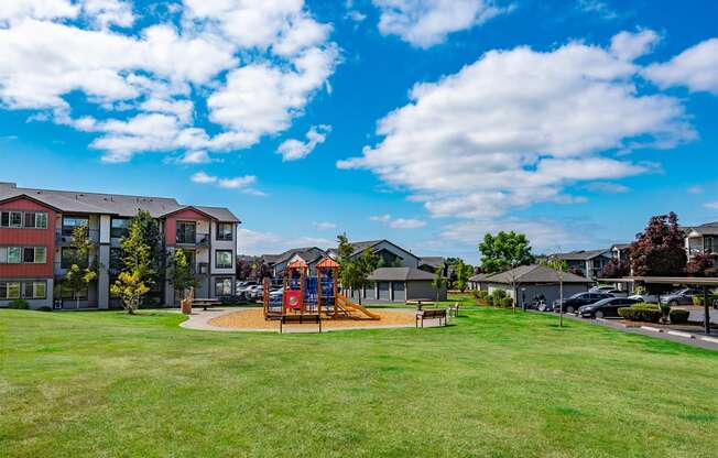 the preserve at ballantyne commons park with playground and apartment buildings