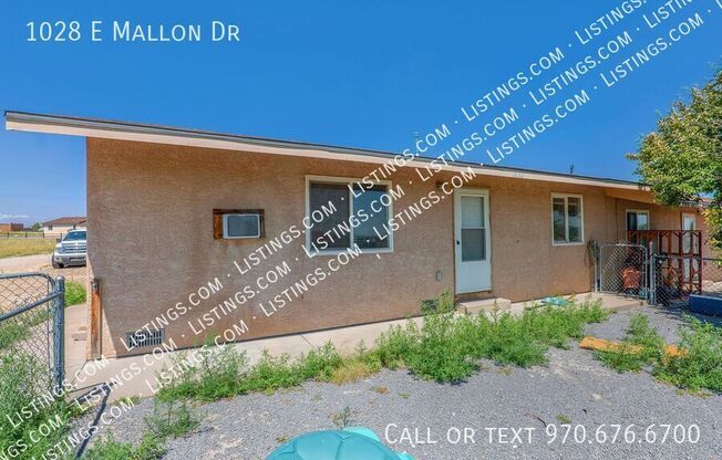 1028 E MALLON DR