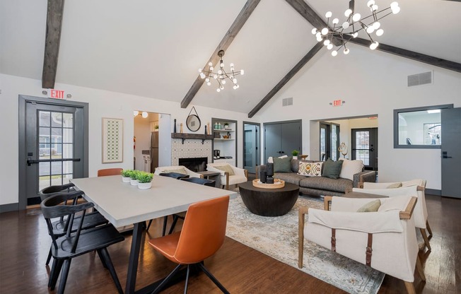 apartment club house lounge with long table and lounge seating