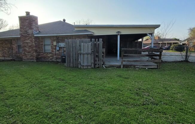 3 Bedroom and 2 Bath Duplex with Carport and Fenced Back Yard