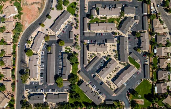 an aerial view of a parking lot in a residential area