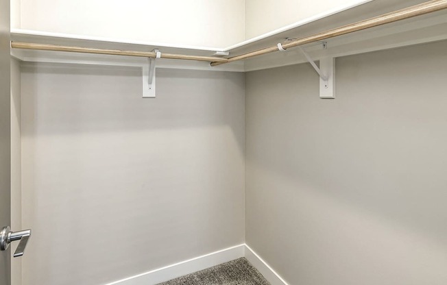 A white door with a silver handle is closed.