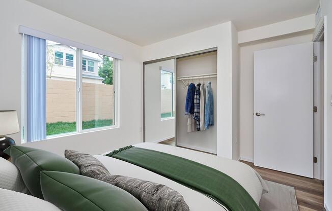 a living room filled with furniture and a large window