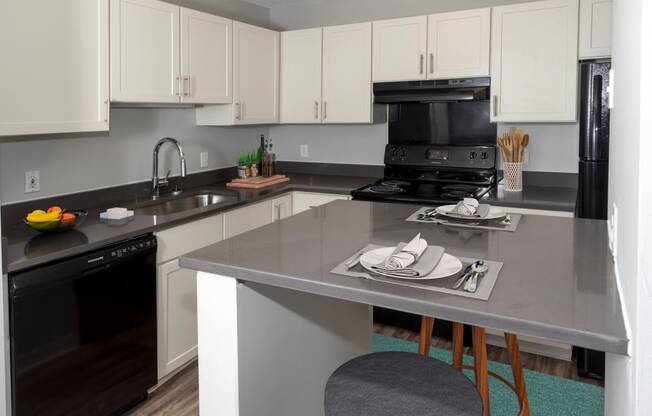 Granite Counter Tops In Kitchen at Audenn Apartments, Bloomington, MN