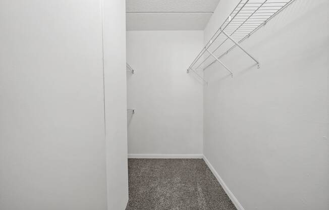 Renovated Bedroom Closet space at Woodland Ridge Apartments in Woodridge, IL