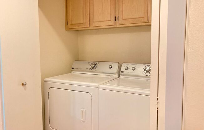 Spacious sun filled 2 bedroom with Washer/ Dryer in unit and garage!